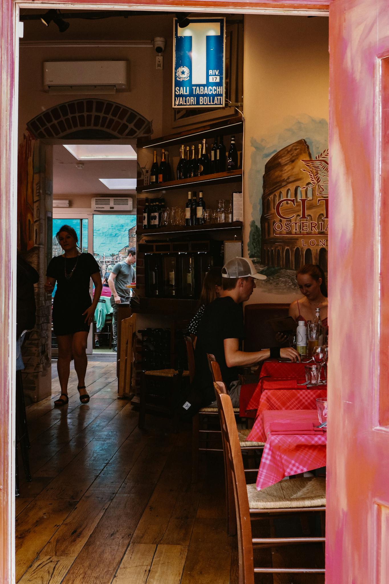 A Woman Walking into a Bar